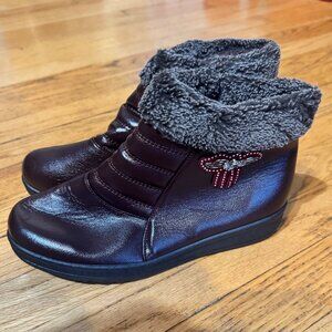Women's warm, jewel embellished faux fur lined ankle boots.